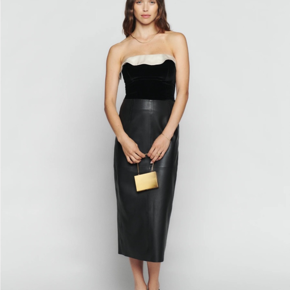 Reformation Beautiful strapless Black Velvet top with a satin trim!